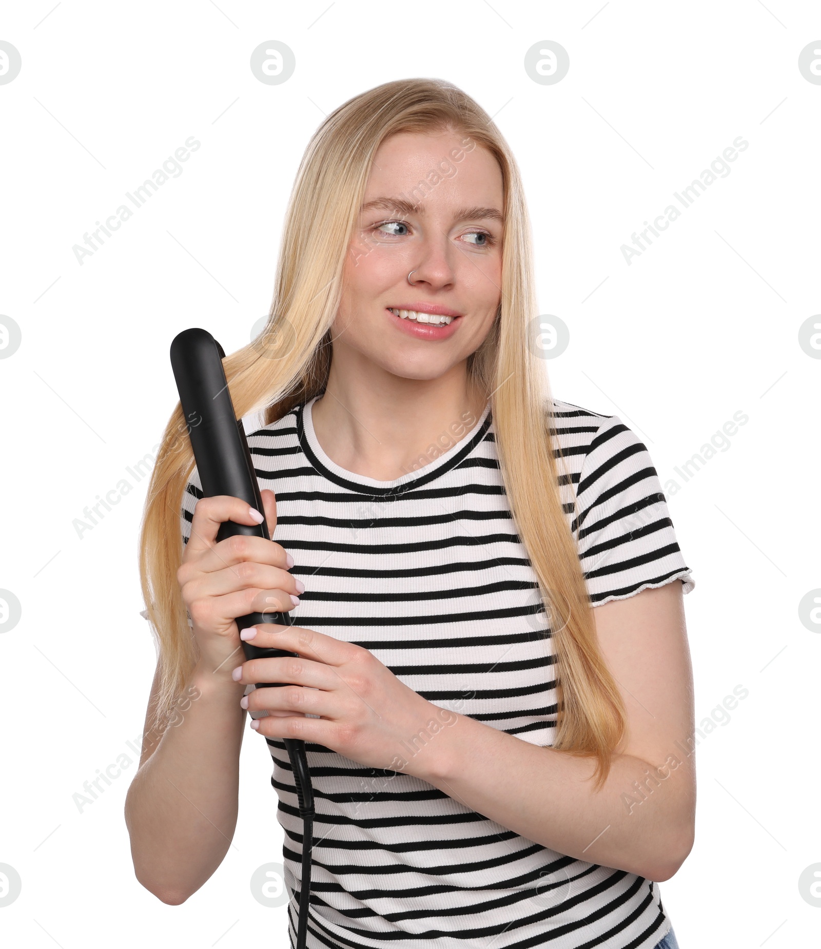 Photo of Woman straightening her hair on white background