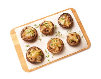 Photo of Delicious stuffed mushrooms with melted cheese and thyme isolated on white, top view