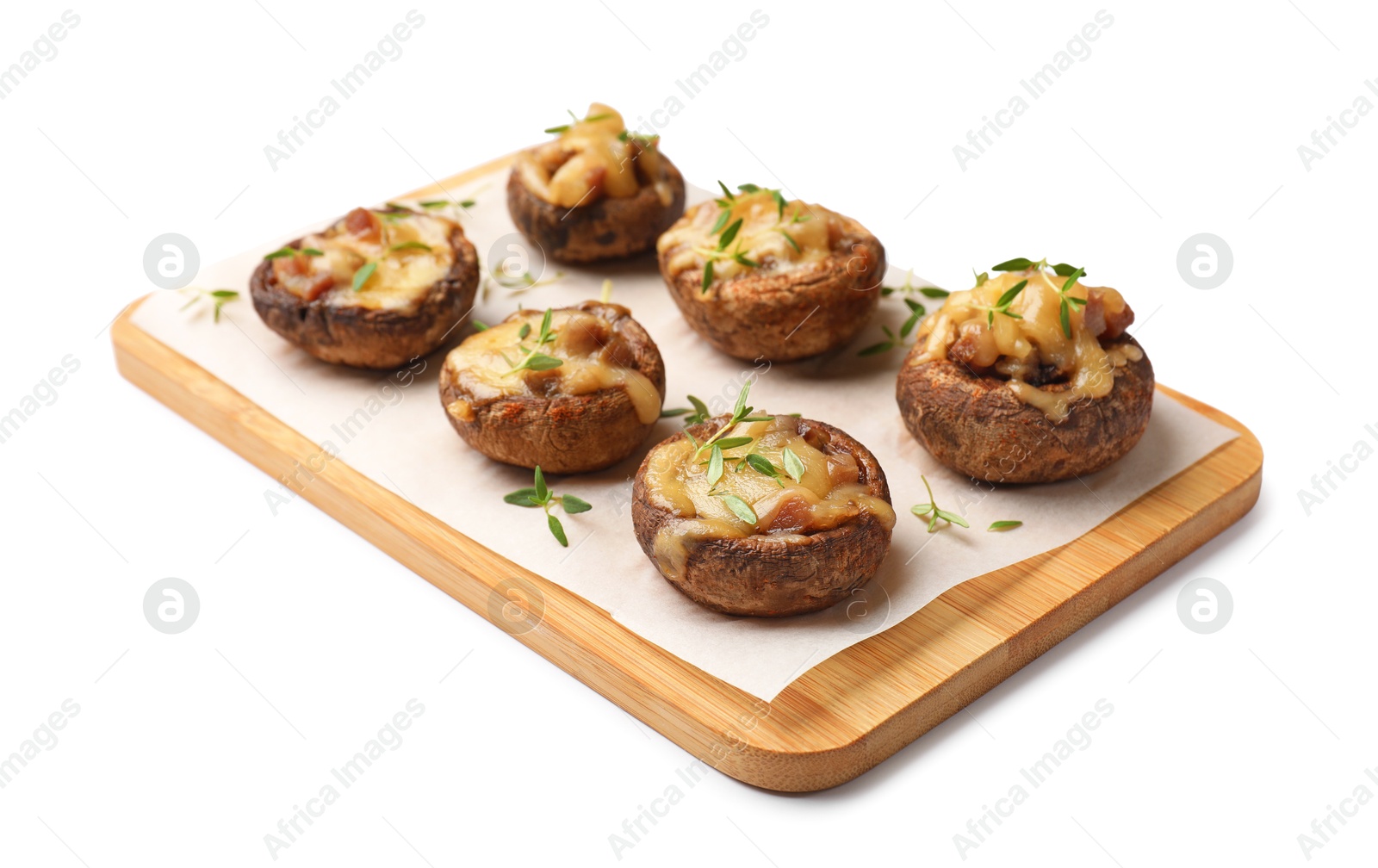 Delicious stuffed mushrooms with melted cheese and thyme isolated on white Photo of Delicious stuffed mushrooms with melted cheese and thyme isolated on white