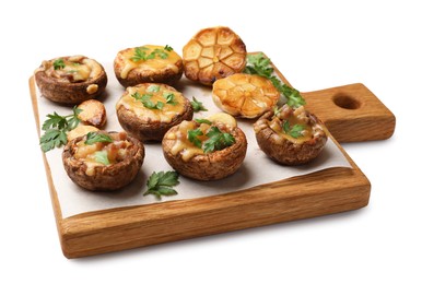 Photo of Delicious stuffed mushrooms with melted cheese, garlic and parsley isolated on white