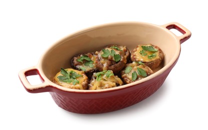 Photo of Delicious stuffed mushrooms with melted cheese and parsley in baking dish isolated on white
