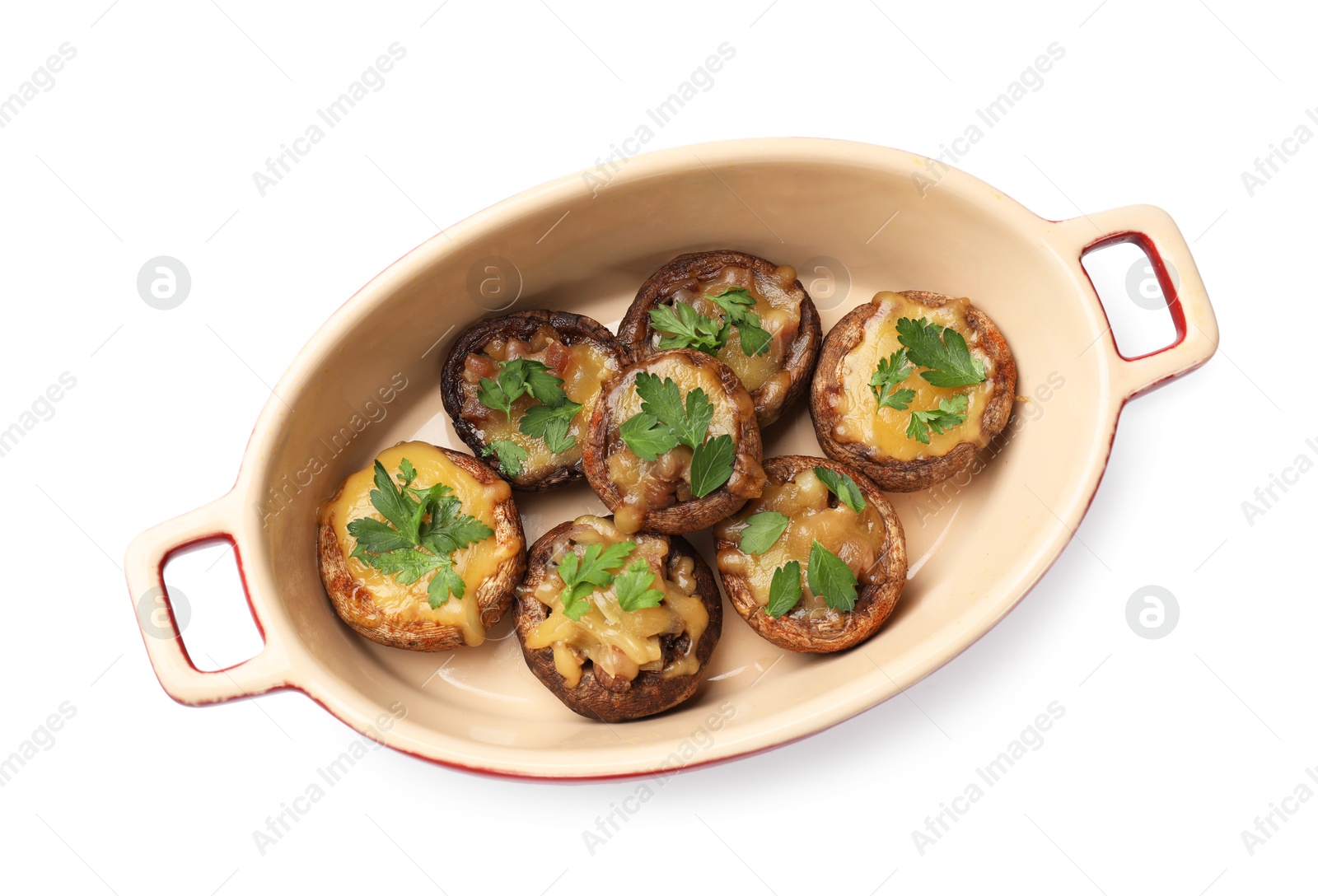 Delicious stuffed mushrooms with melted cheese and parsley in baking dish isolated on white, top view Photo of Delicious stuffed mushrooms with melted cheese and parsley in baking dish isolated on white, top view