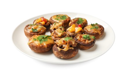Photo of Many tasty stuffed mushrooms isolated on white