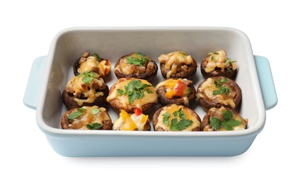 Photo of Tasty stuffed mushrooms in baking dish isolated on white, above view