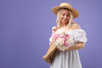 Photo of Happy woman with bouquet of beautiful peonies on purple background, space for text