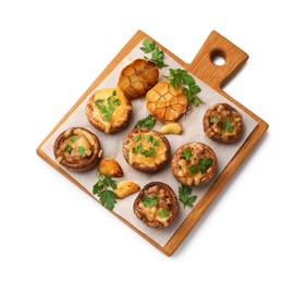 Photo of Delicious stuffed mushrooms with melted cheese, garlic and parsley isolated on white, top view