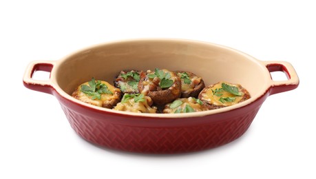 Photo of Delicious stuffed mushrooms with melted cheese and parsley in baking dish isolated on white