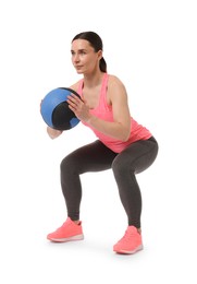 Photo of Athletic woman exercising with medicine ball on white background