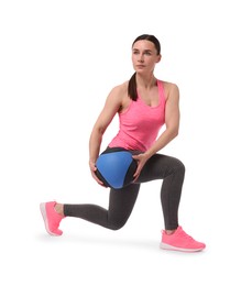 Photo of Athletic woman exercising with medicine ball on white background
