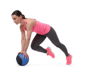 Photo of Athletic woman exercising with medicine ball on white background