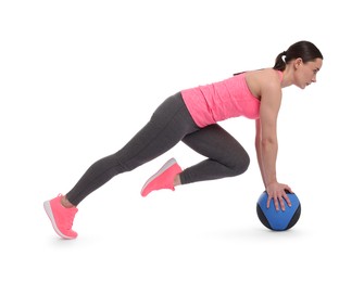 Photo of Athletic woman exercising with medicine ball on white background