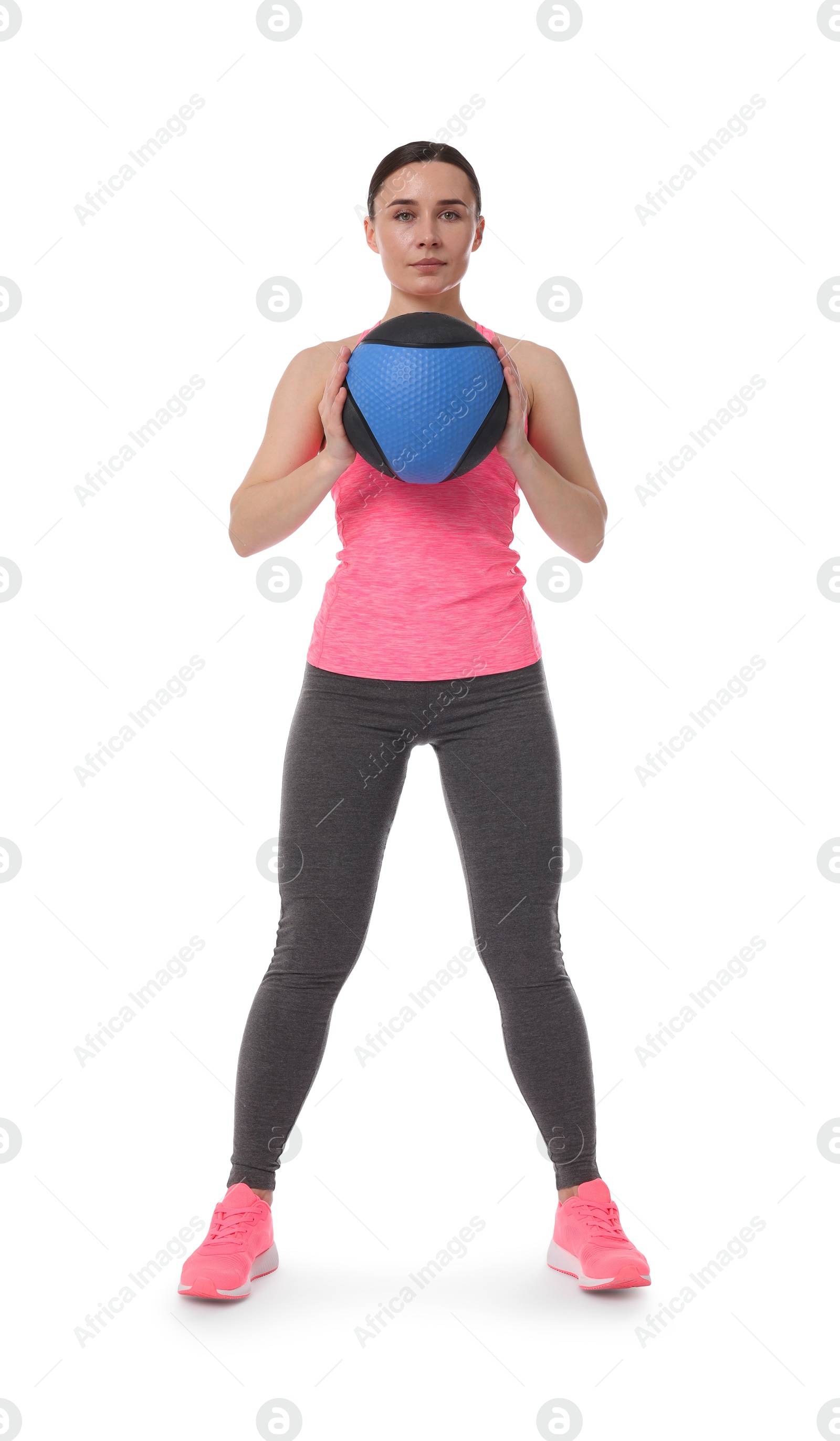 Photo of Woman with medicine ball on white background