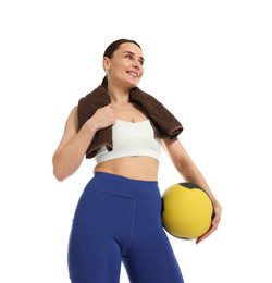Photo of Woman with medicine ball on white background, low angle view