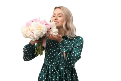 Photo of Happy woman with bouquet of beautiful peonies on white background