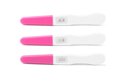 Image of Three pregnancy tests with positive, negative and invalid results isolated on white, set