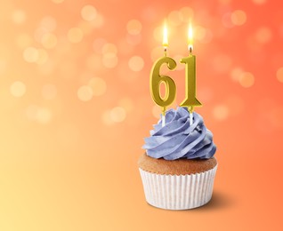 Image of Yummy cupcake with burning number shaped candles on color gradient background with blurred lights, space for text. 61th birthday or other special occasion
