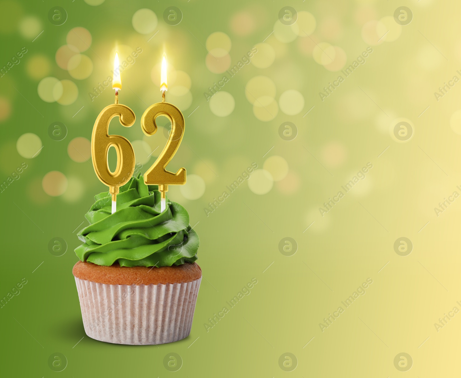 Yummy cupcake with burning number shaped candles on green gradient background with blurred lights, space for text. 62th birthday or other special occasion Image of Yummy cupcake with burning number shaped candles on green gradient background with blurred lights, space for text. 62th birthday or other special occasion
