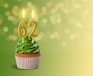 Image of Yummy cupcake with burning number shaped candles on green gradient background with blurred lights, space for text. 62th birthday or other special occasion