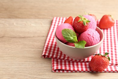 Photo of Refreshing sorbet, strawberries and mint on wooden table, closeup. Space for text