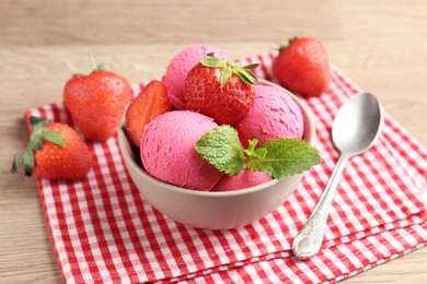Photo of Refreshing sorbet, strawberries and mint on wooden table, closeup