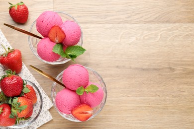 Photo of Refreshing sorbet, strawberries and mint on wooden table, flat lay. Space for text