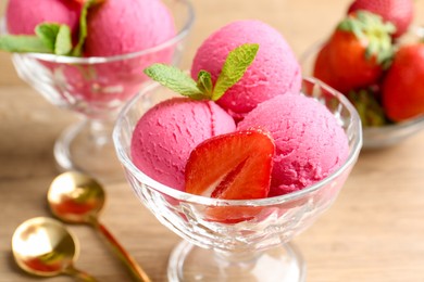 Photo of Refreshing sorbet, strawberry and mint in dessert bowl on table, closeup