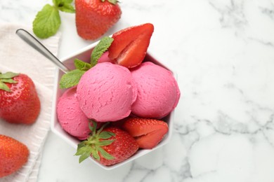 Photo of Refreshing sorbet, strawberries and mint in bowl on white marble table, flat lay. Space for text