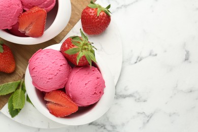 Photo of Refreshing sorbet, strawberries and mint on white marble table, flat lay. Space for text