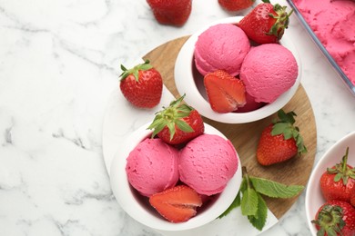Photo of Refreshing sorbet, strawberries and mint on white marble table, flat lay. Space for text