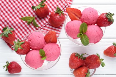 Photo of Refreshing sorbet, strawberries and mint on white wooden table, flat lay