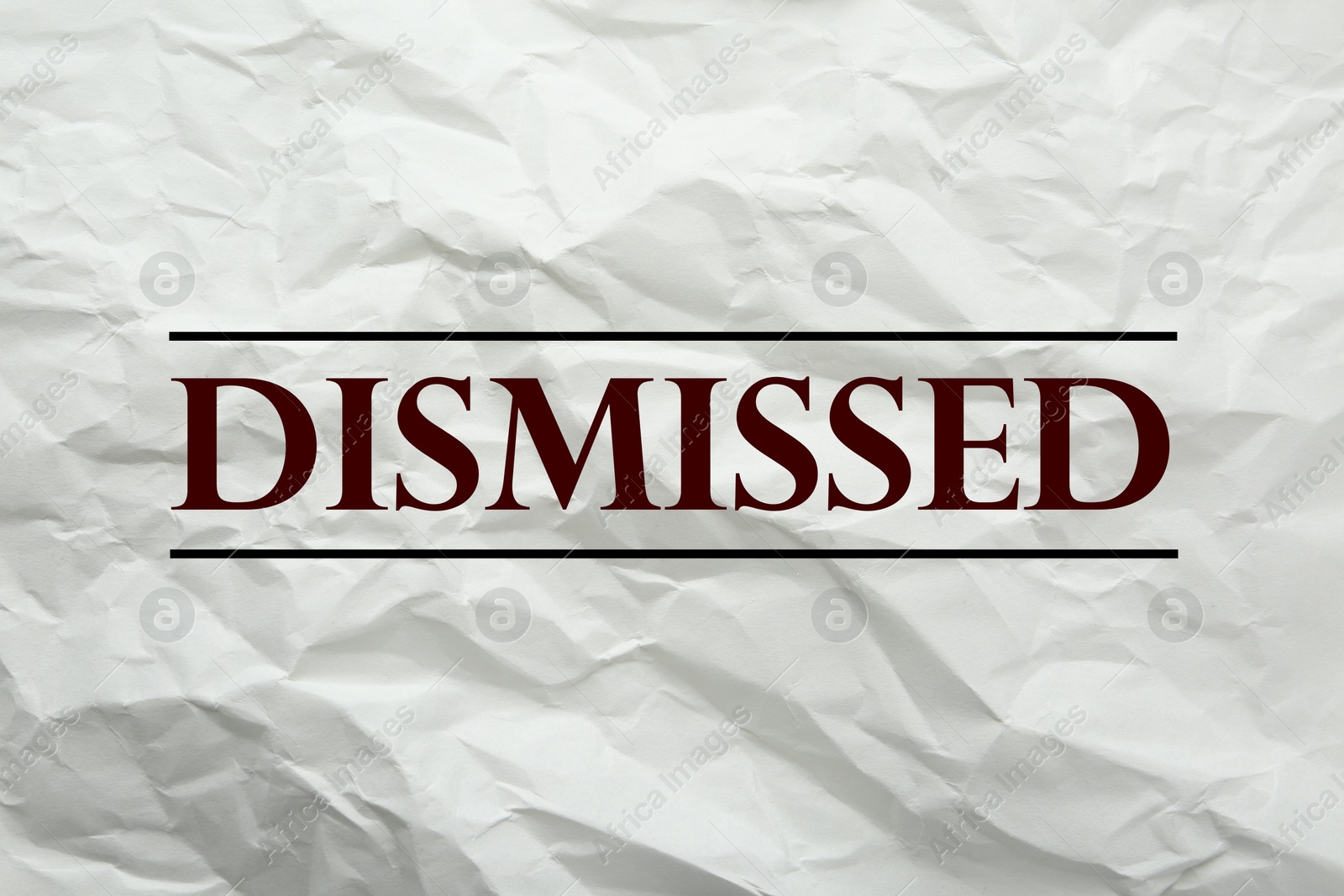Word Dismissed on crumpled paper as background Image of Word Dismissed on crumpled paper as background