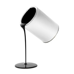 Image of Black paint pouring out of can on white background