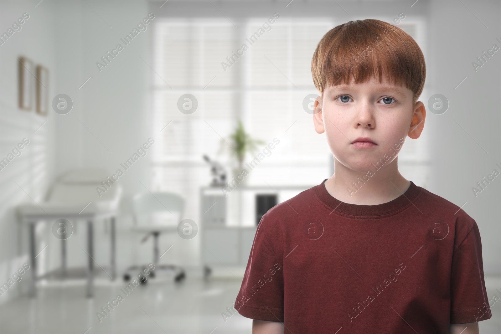 Image of Little boy in children's hospital. Space for text