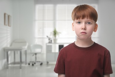 Image of Little boy in children's hospital. Space for text