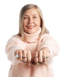 Photo of Senior woman wearing different rings on white background