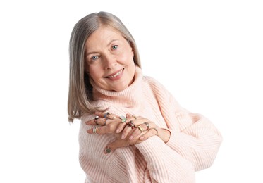 Photo of Senior woman wearing different rings on white background