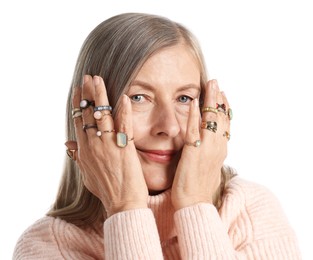 Photo of Senior woman wearing different rings on white background