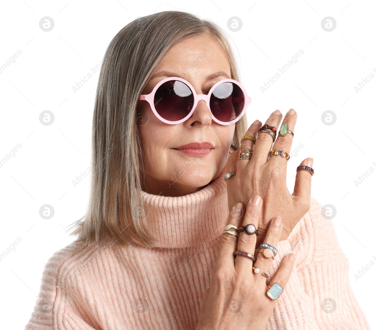 Senior woman wearing different rings on white background Photo of Senior woman wearing different rings on white background
