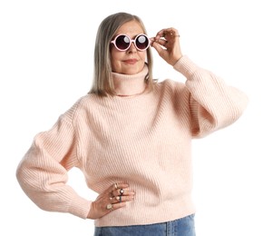 Photo of Senior woman wearing different rings and sunglasses on white background
