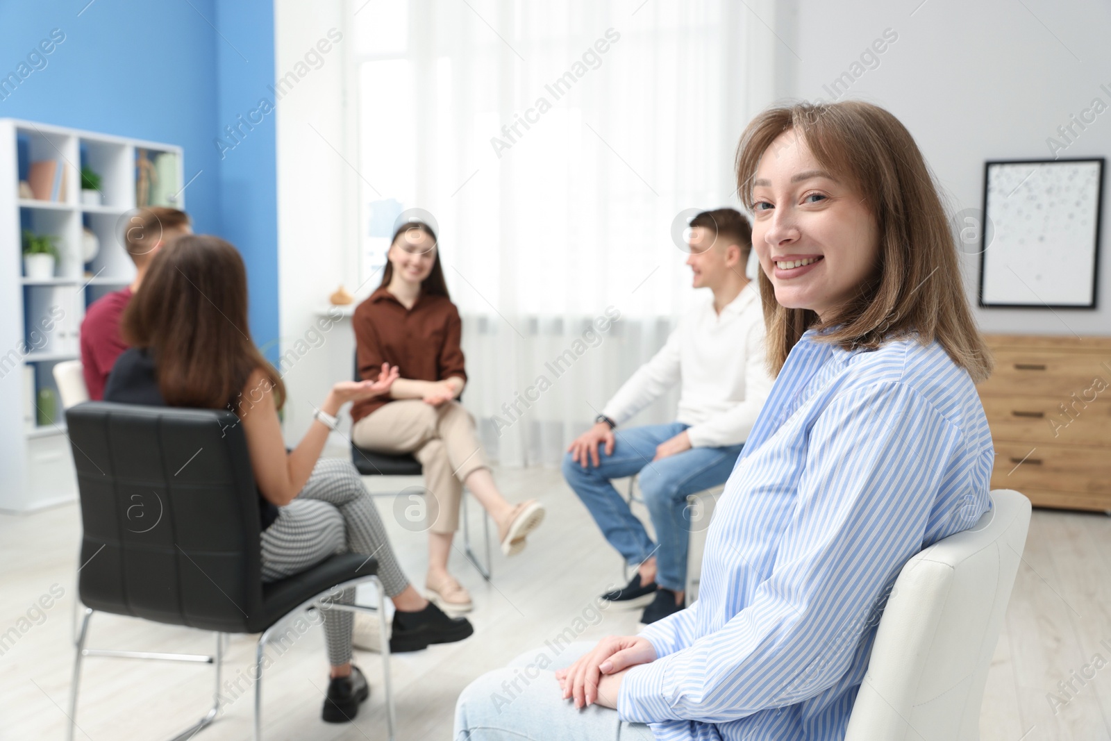 Group of people having meeting during life coaching class indoors, selective focus Photo of Group of people having meeting during life coaching class indoors, selective focus