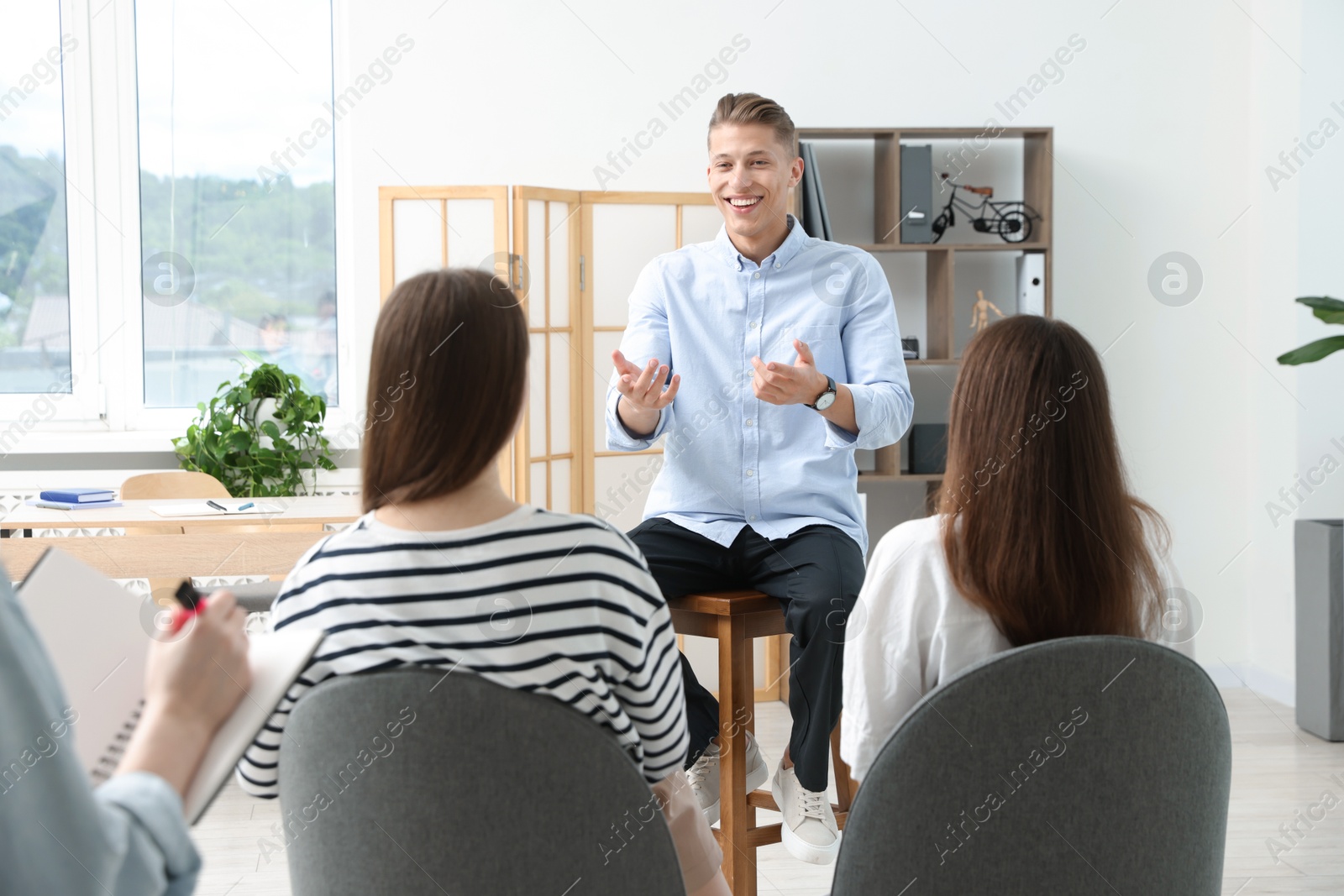 Group of people having meeting during life coaching class indoors Photo of Group of people having meeting during life coaching class indoors