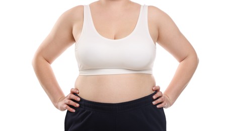 Photo of Weight loss. Plus size woman in underwear on white background, closeup