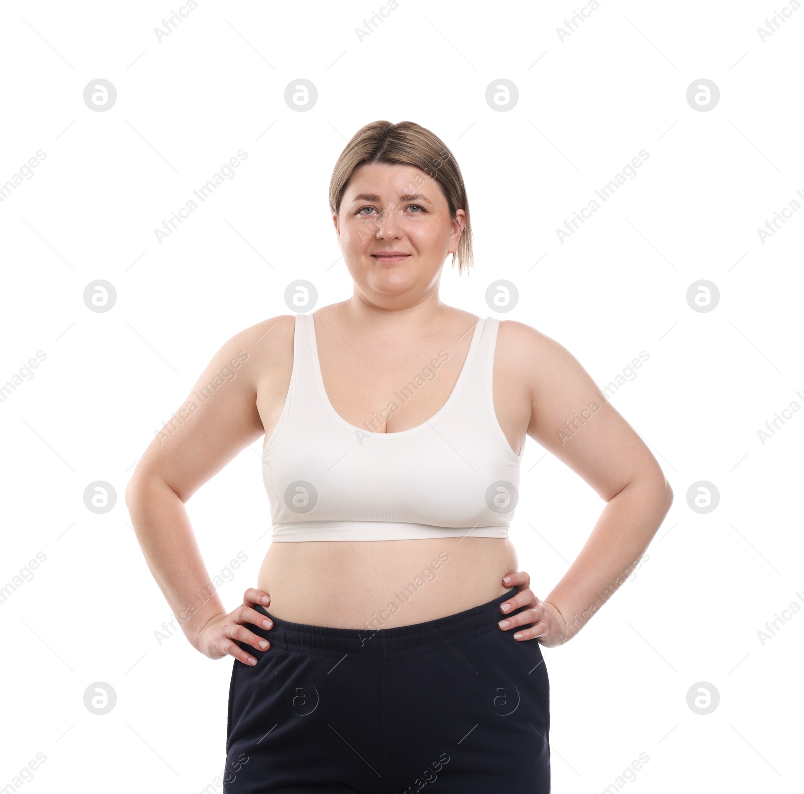 Weight loss. Plus size woman in underwear on white background Photo of Weight loss. Plus size woman in underwear on white background
