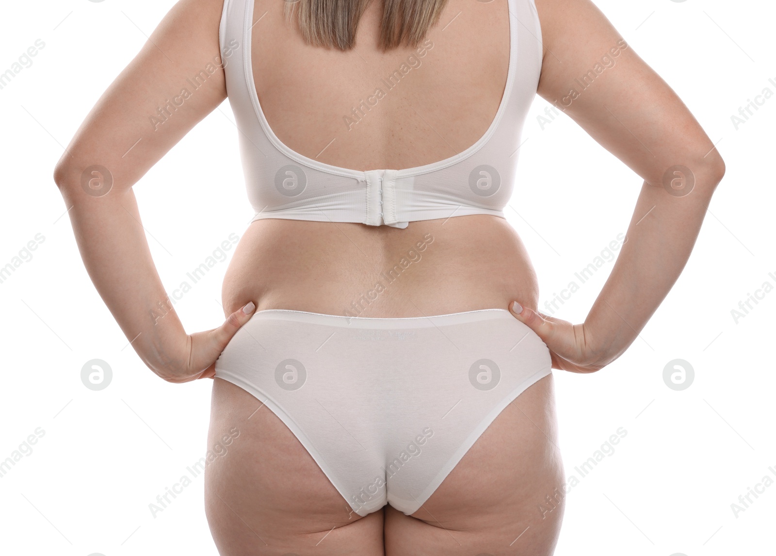 Weight loss. Plus size woman in underwear on white background, closeup Photo of Weight loss. Plus size woman in underwear on white background, closeup