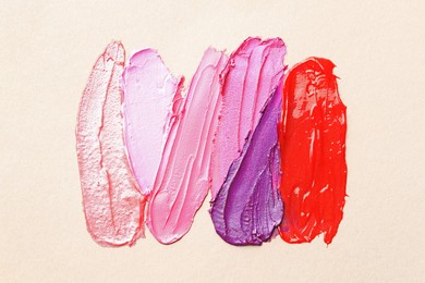Photo of Different cosmetic products on light background, flat lay