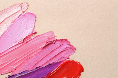 Photo of Different cosmetic products on light background, closeup. Space for text