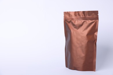 Photo of One zipper stand-up pouch on light grey background. Mockup for design