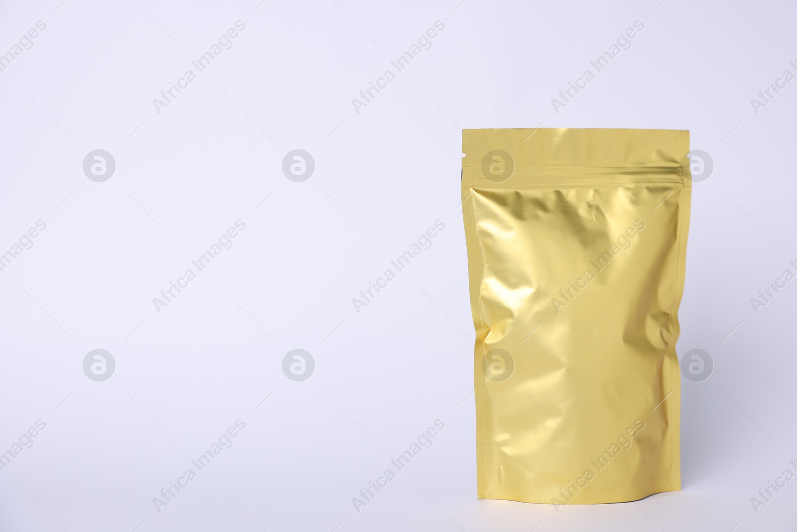 One zipper stand-up pouch on light grey background. Mockup for design Photo of One zipper stand-up pouch on light grey background. Mockup for design
