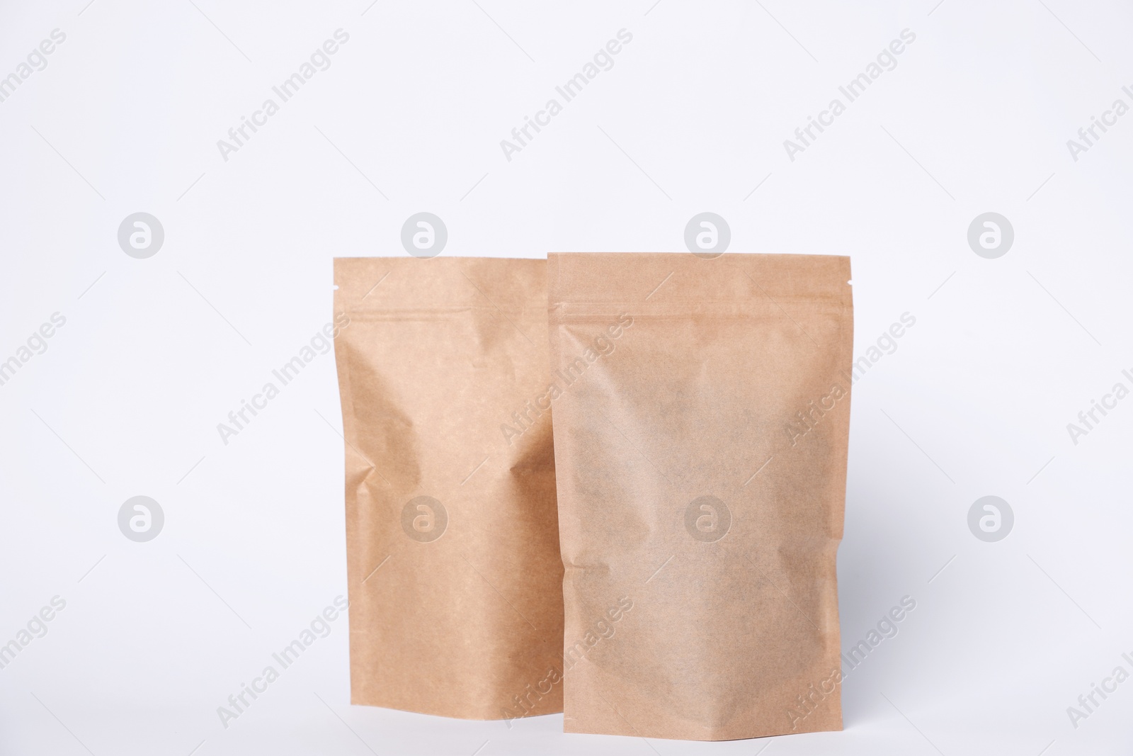 Zipper stand-up pouches on white background. Mockup for design Photo of Zipper stand-up pouches on white background. Mockup for design