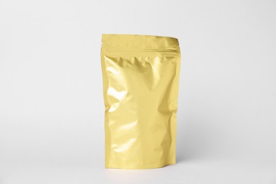 Photo of One zipper stand-up pouch on white background. Mockup for design